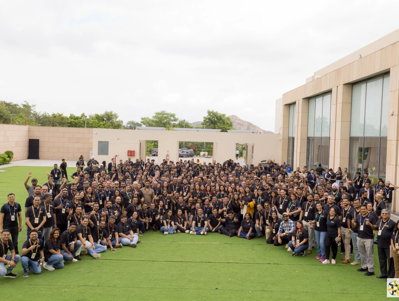 The Travel Nexus community gathered outdoors for a large group photograph